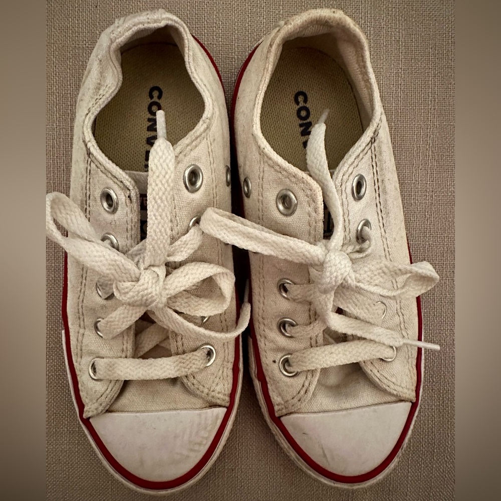 Kids white Converse Chuck Taylor street shoes